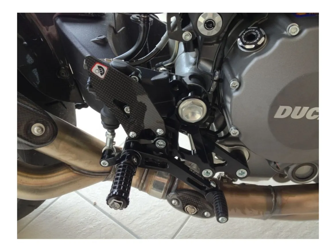 PEDANE REGOLABILI DBK DUCATI MONSTER 696 / 796 / 1100 EVO